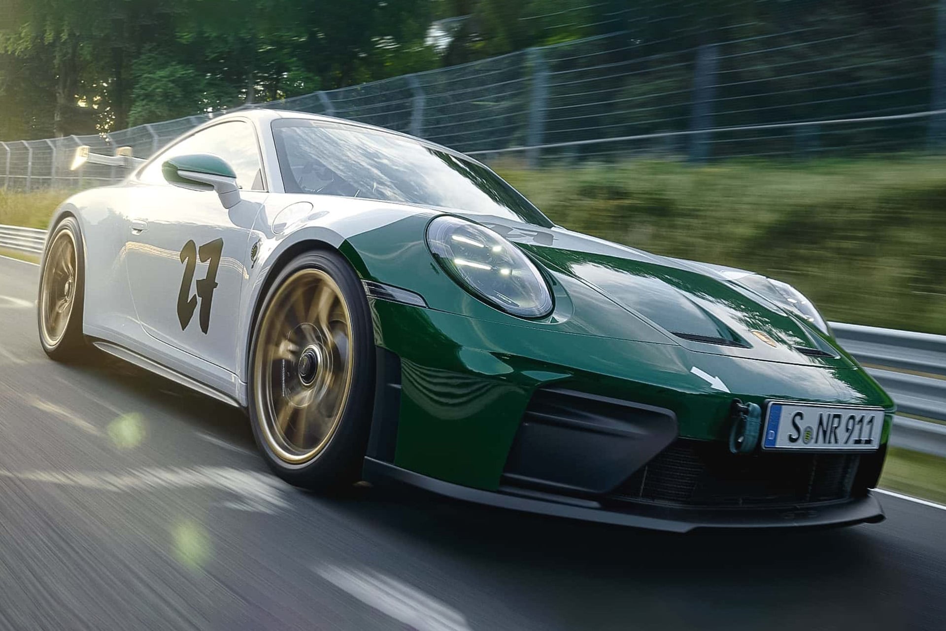 white and green 911 gt3 on race track