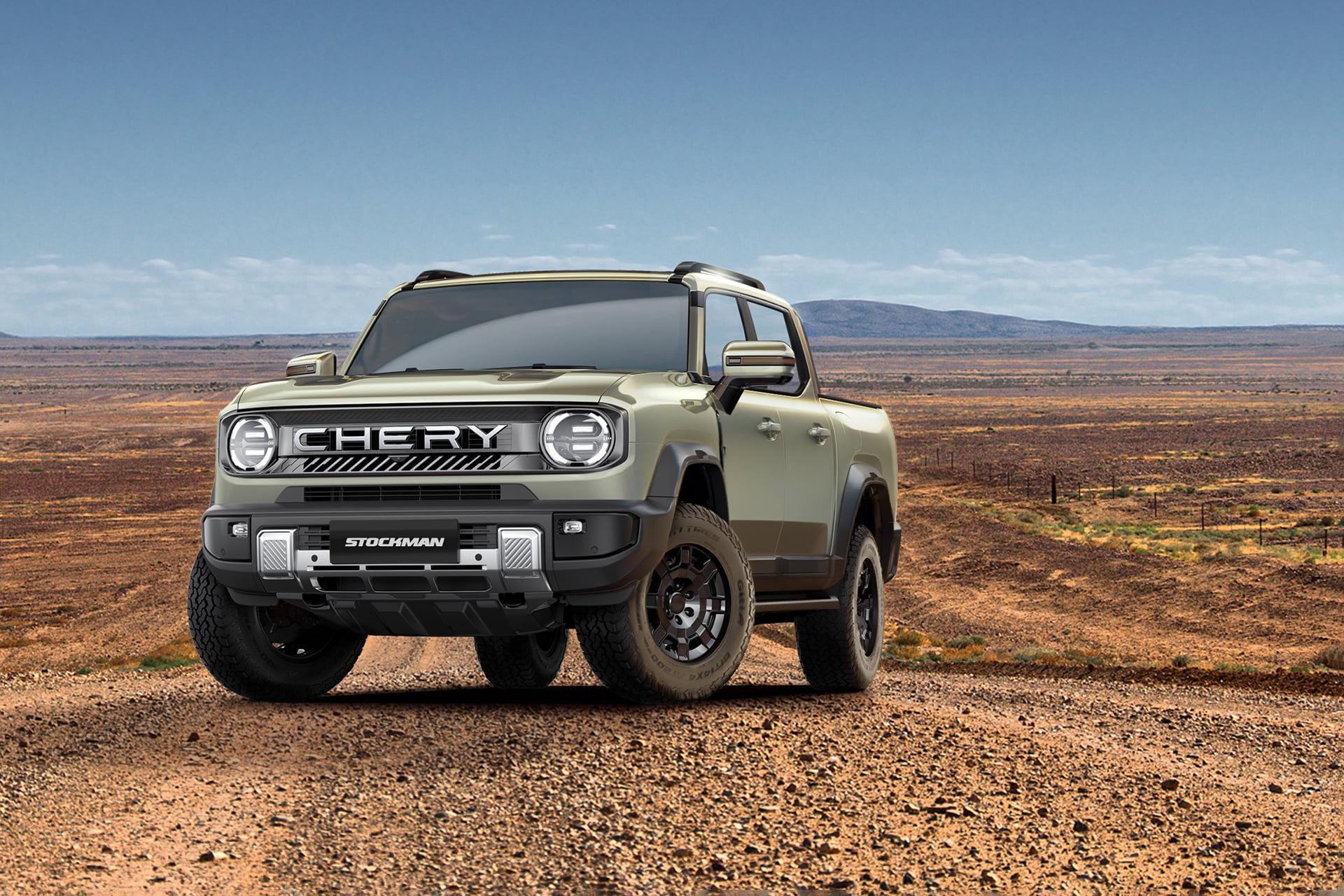 Stockman ute in green on a dusty road in the outback