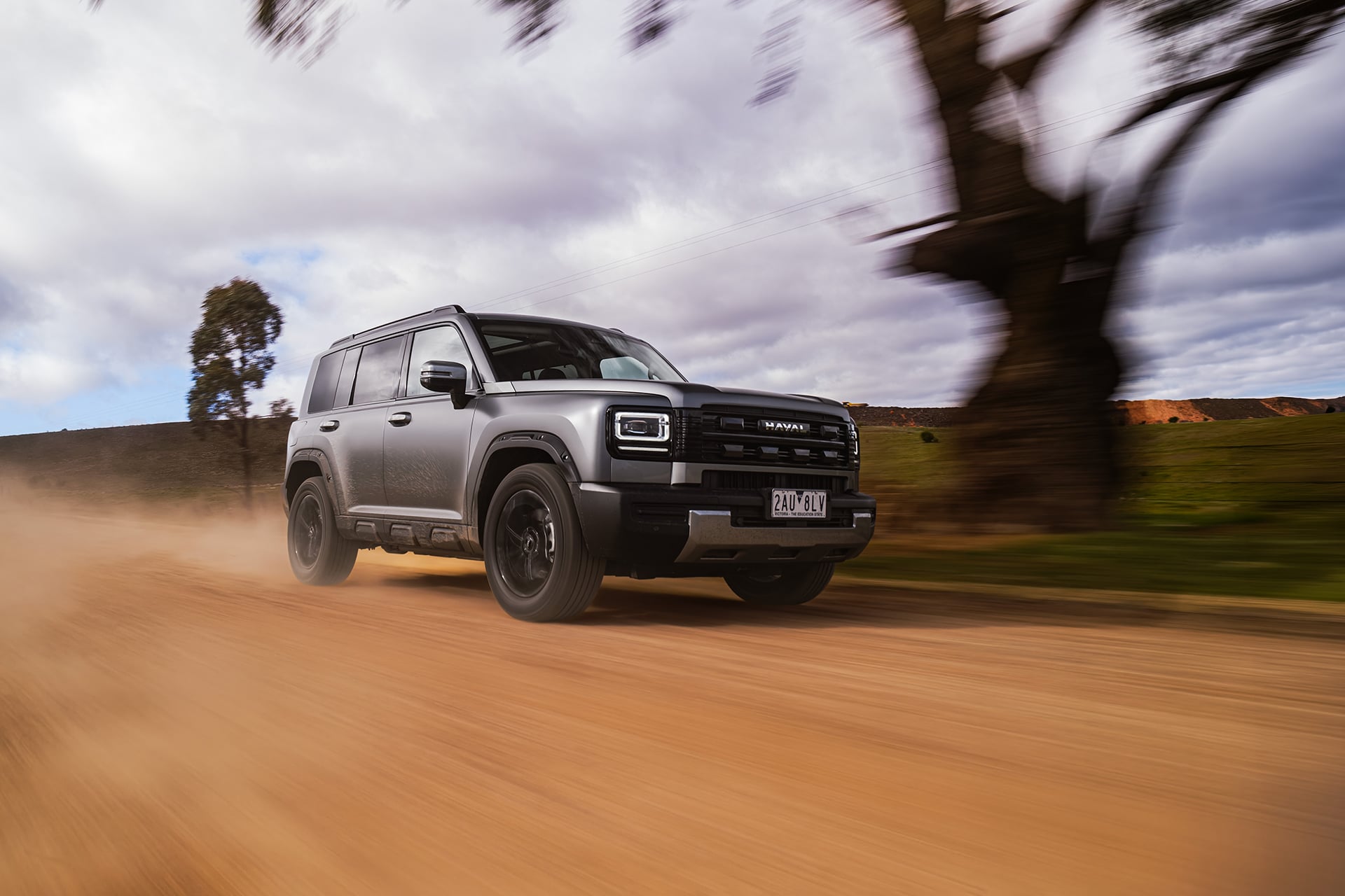 H7 in silver on a dirt road