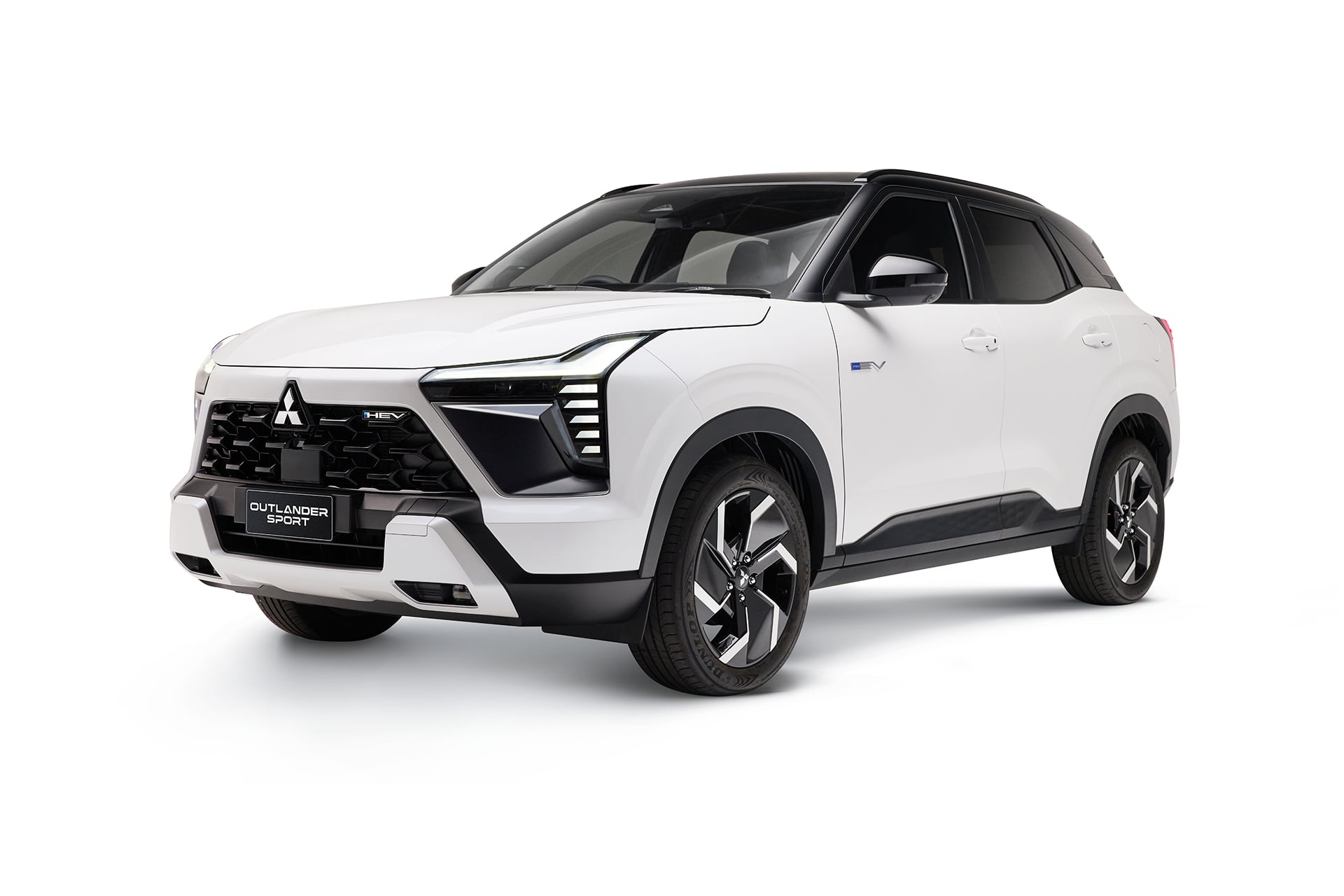 Outlander Sport HEV in white on white back ground