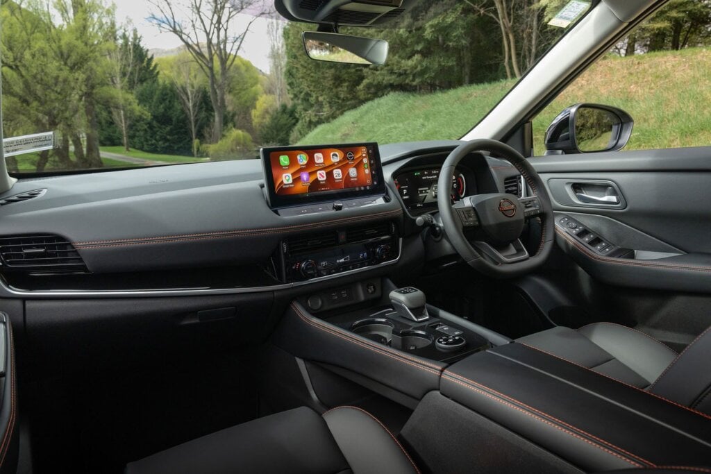 2026 Nissan X-Trail Rock Creek interior with orange stitching