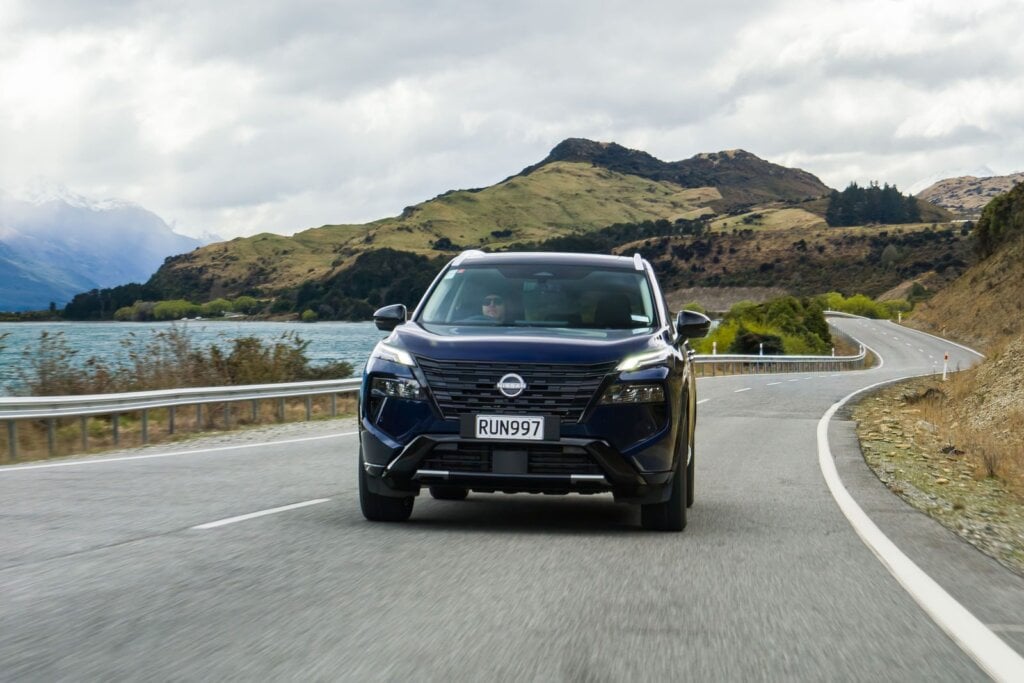 2026 Nissan X-Trail Ti-L 2WD e-Power driving on a coastal road
