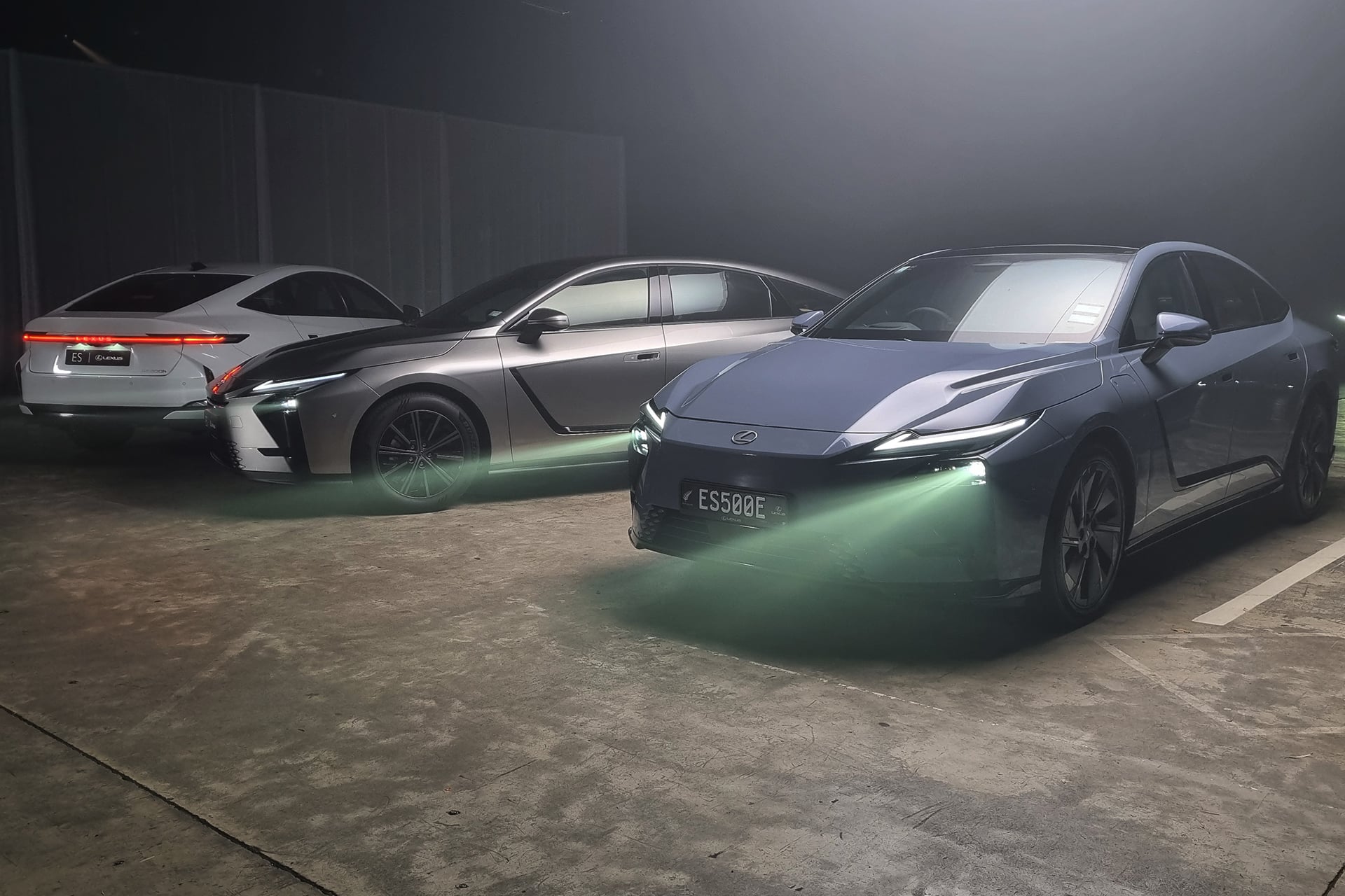 cars in low light in a warehouse