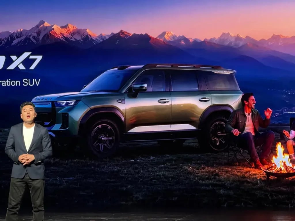 Chery Tiggo X7 parked at a mountain campsite in a presentation image