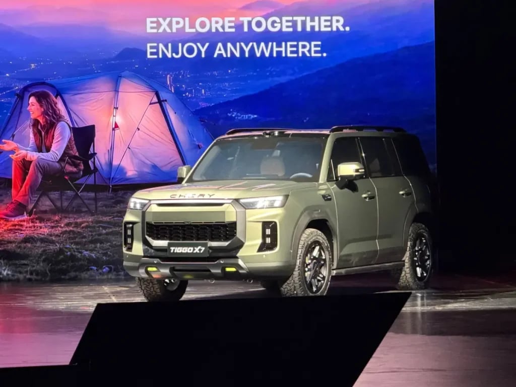 Chery Tiggo X7 on stage in front of a camping scene at its China preview event