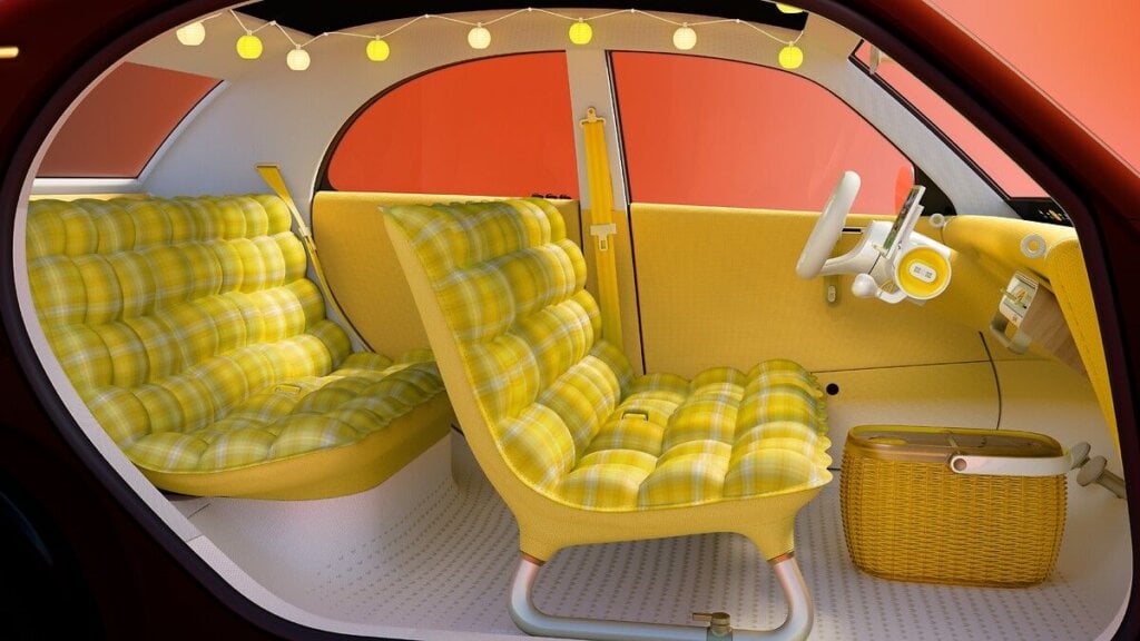 Citroën 2 CV Concept cabin with yellow tartan seats and wicker basket