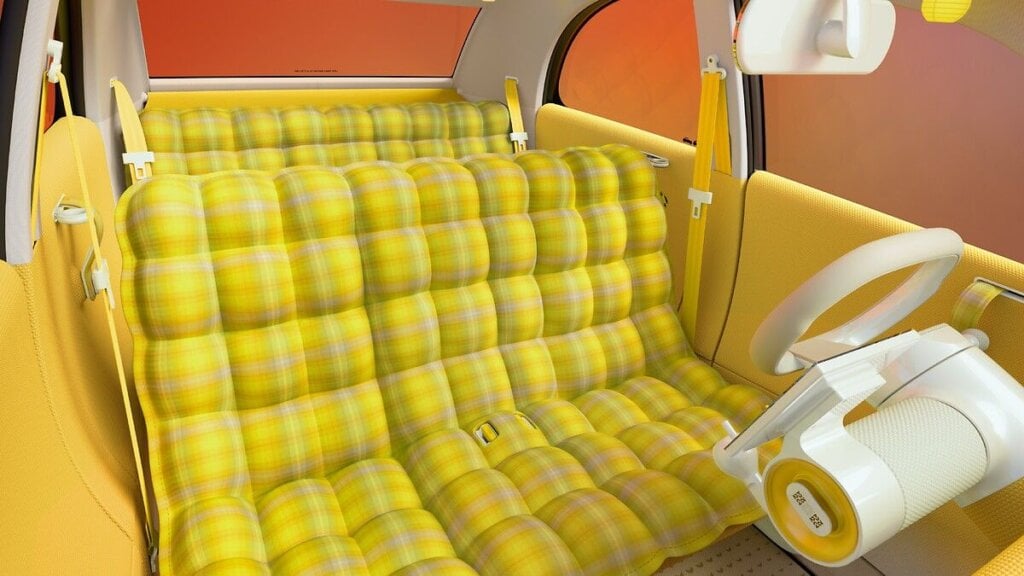 Yellow tartan bench-style seats in the Citroën 2 CV Concept