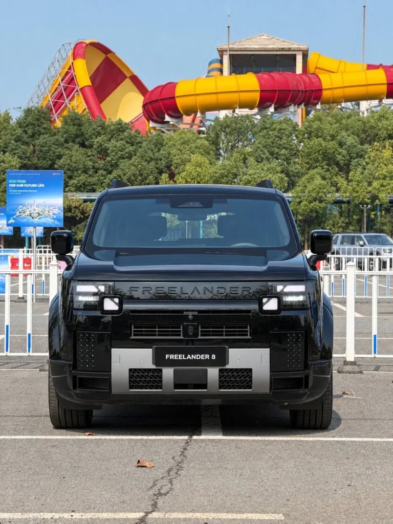 Black Freelander 8 front view showing the interlocking headlights