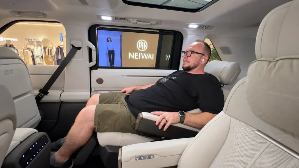 Optional Freelander 8 zero-gravity second-row seat reclined with leg rest raised