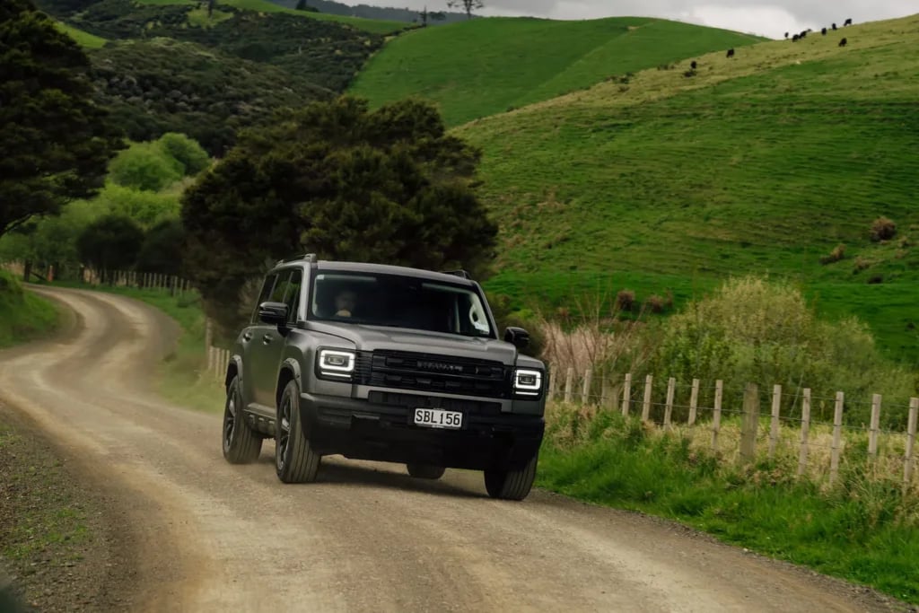 Mystic Grey Haval H7 driving on a gravel farm road