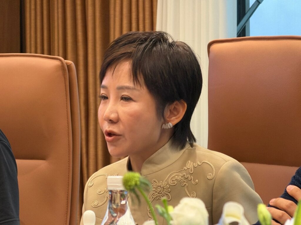 Ronna Luo listening at an iCAUR media round table