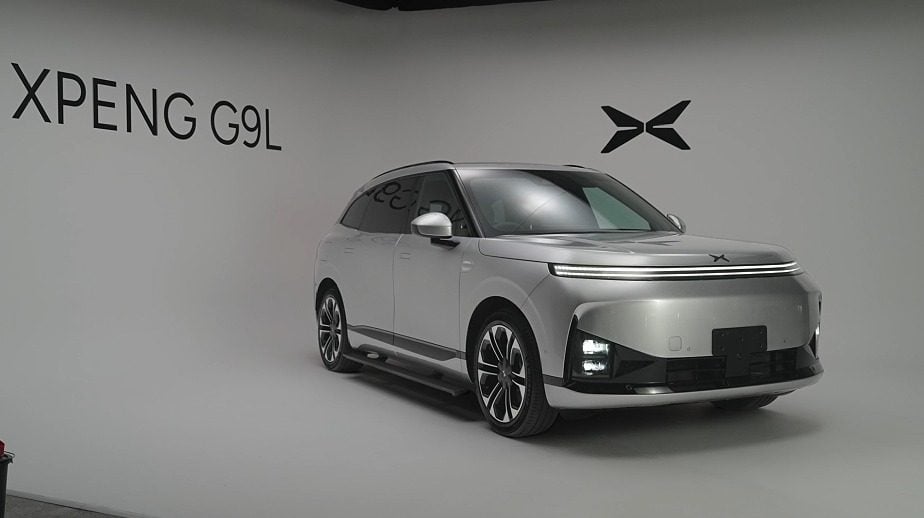 Silver pre-production XPeng G9L at the preview event