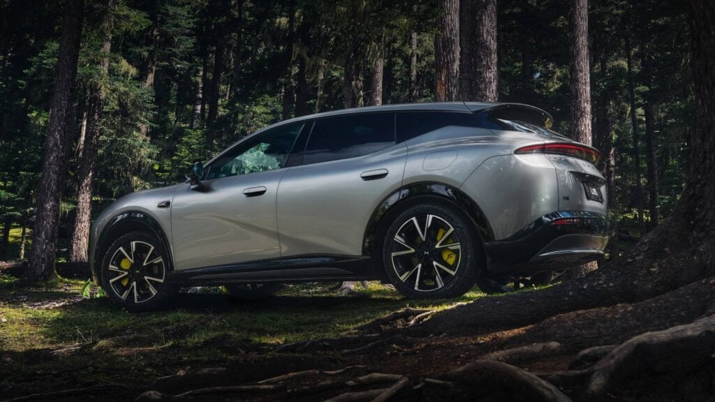 XPeng L05 SUV parked in a forest
