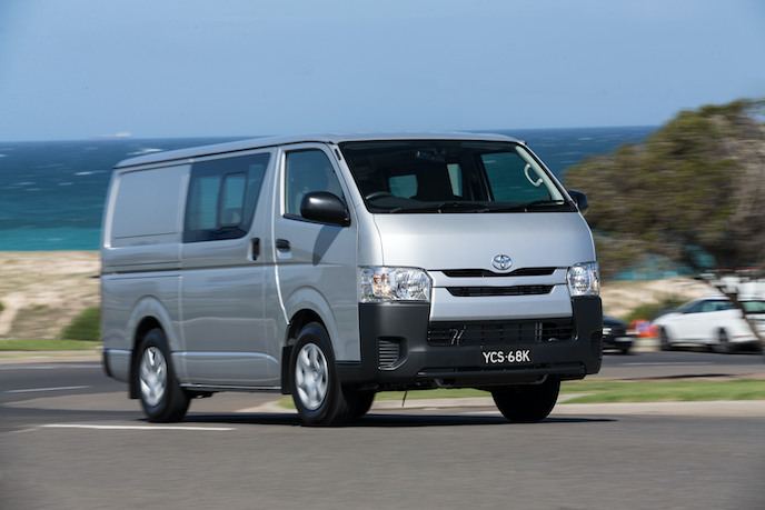 Silver Toyota Hiace van parked by the coast