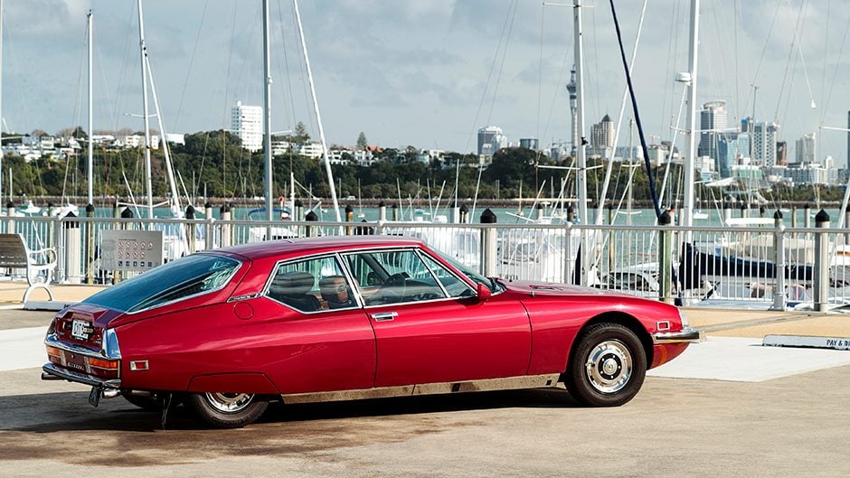 1972 Citroen SM rear static in front of boats