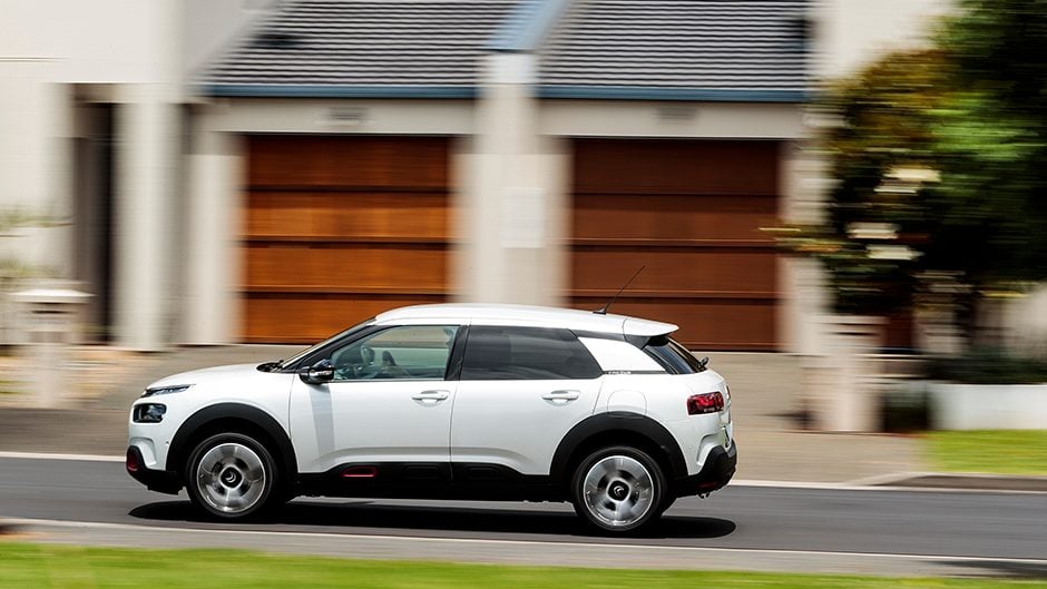 2018 Citroen C4 Cactus driving past houses