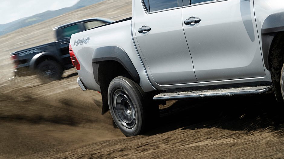 Toyota Hilux Mako kicking up sand