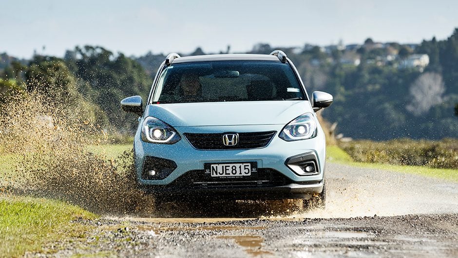 Honda Jazz Crosstar splashing through puddle