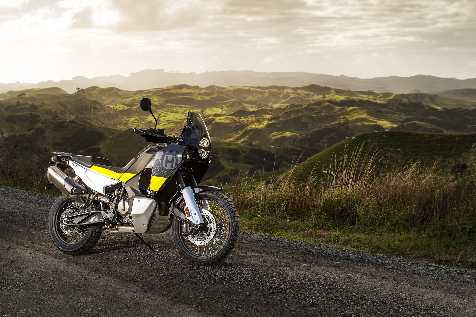 2022 Husqvarna Norden 901 on hilltop with sun setting