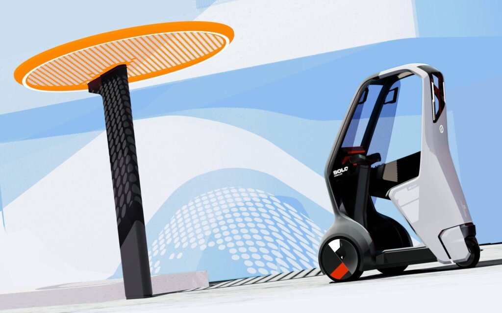 Mobilize Solo rear three quarter view at charging station