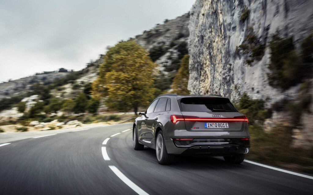 Audi Q8 e-tron rear three quarter view driving