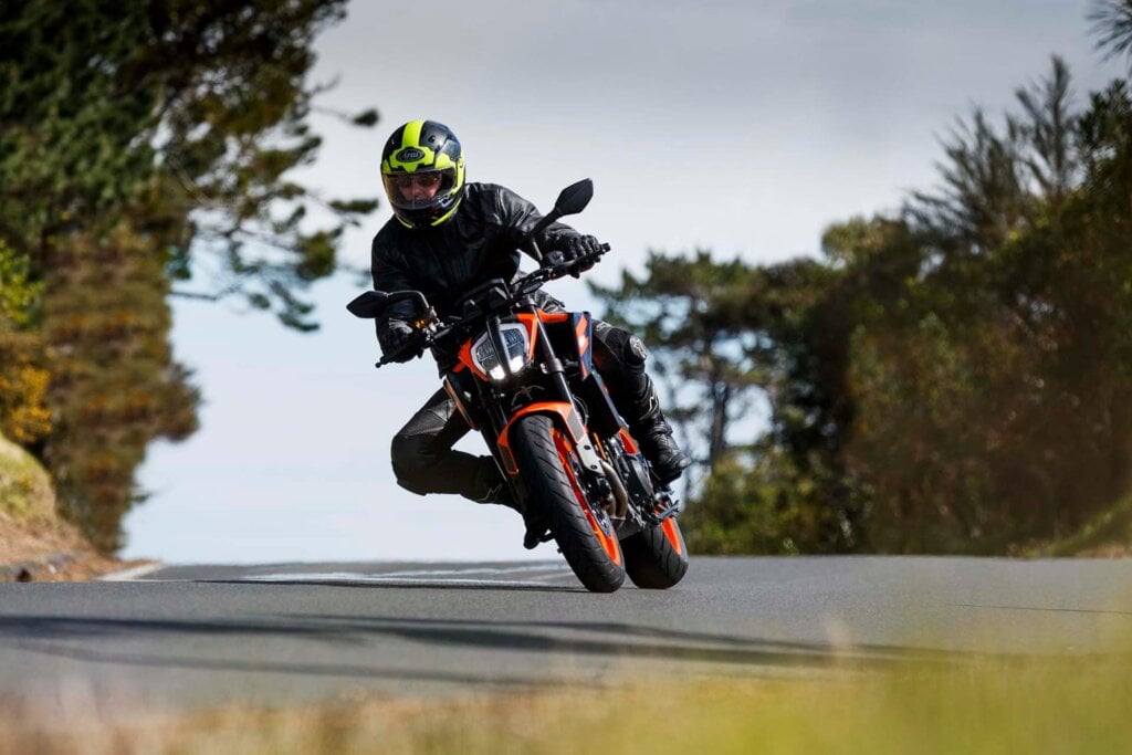 KTM 890 Duke GP riding on road