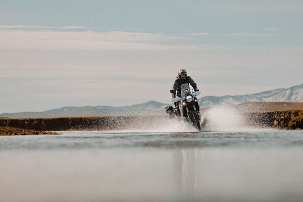 Husqvarna Norden 901 riding through river