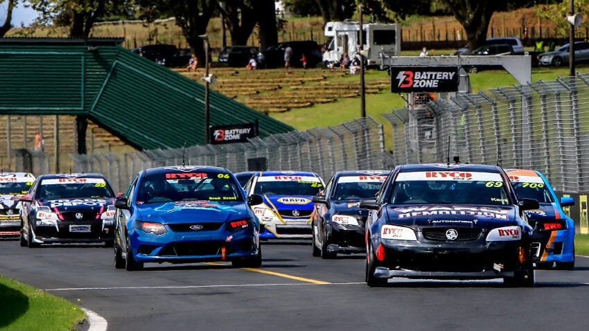 Holden and Ford V8 Utes racing at Pukekohe