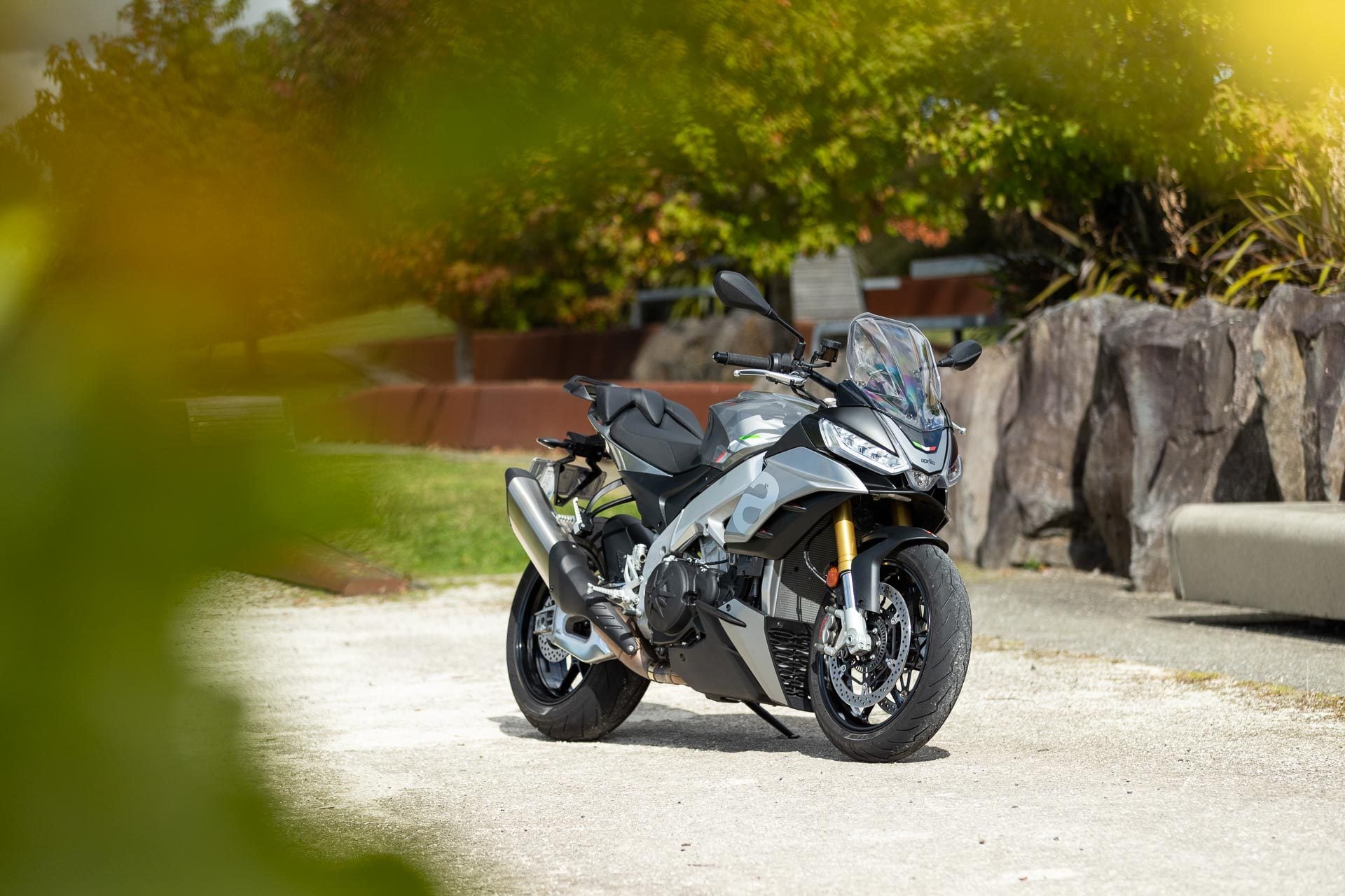 Aprilia Tuono V4 1100 parked on white shell