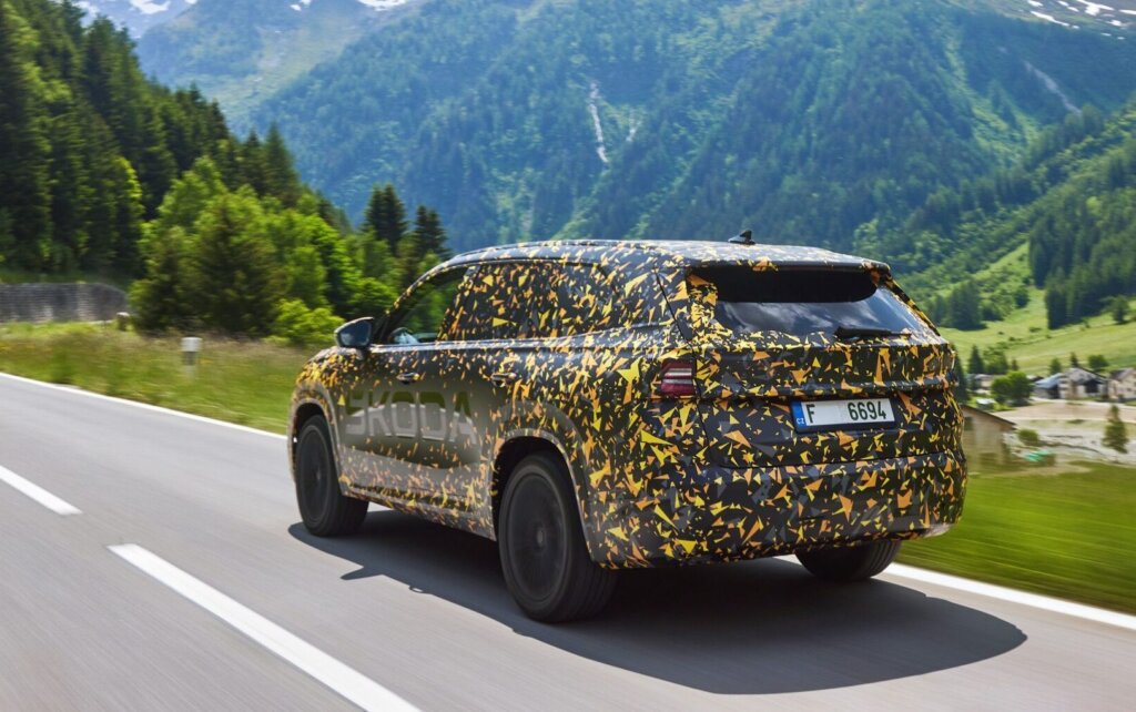 Skoda Kodiaq driving past mountains