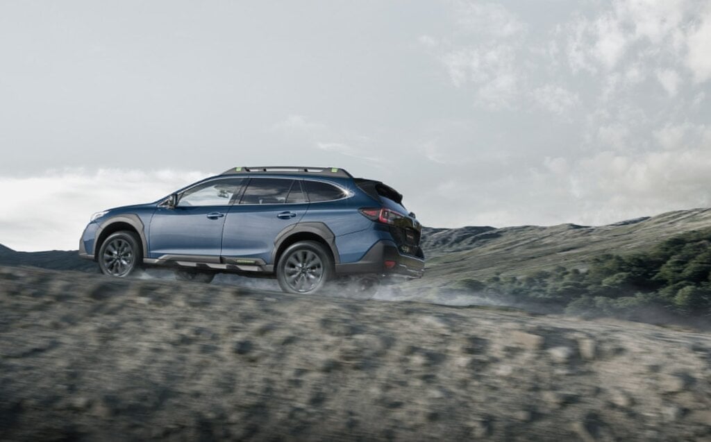 Subaru Outback XT Special Edition driving up hill