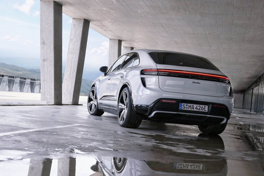 2025 Porsche Macan EV parked under concrete structure