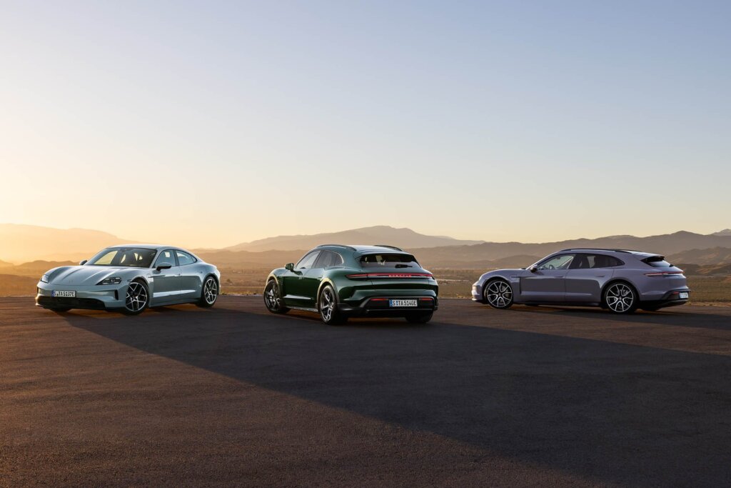 Three updated 2024 Porsche Taycans parked on lookout