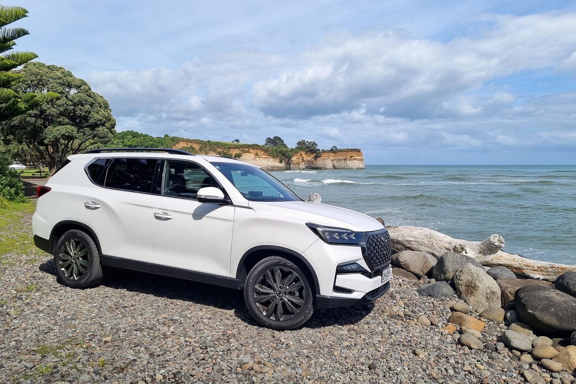 SsangYong Rexton in white, front quarter shot by the beach