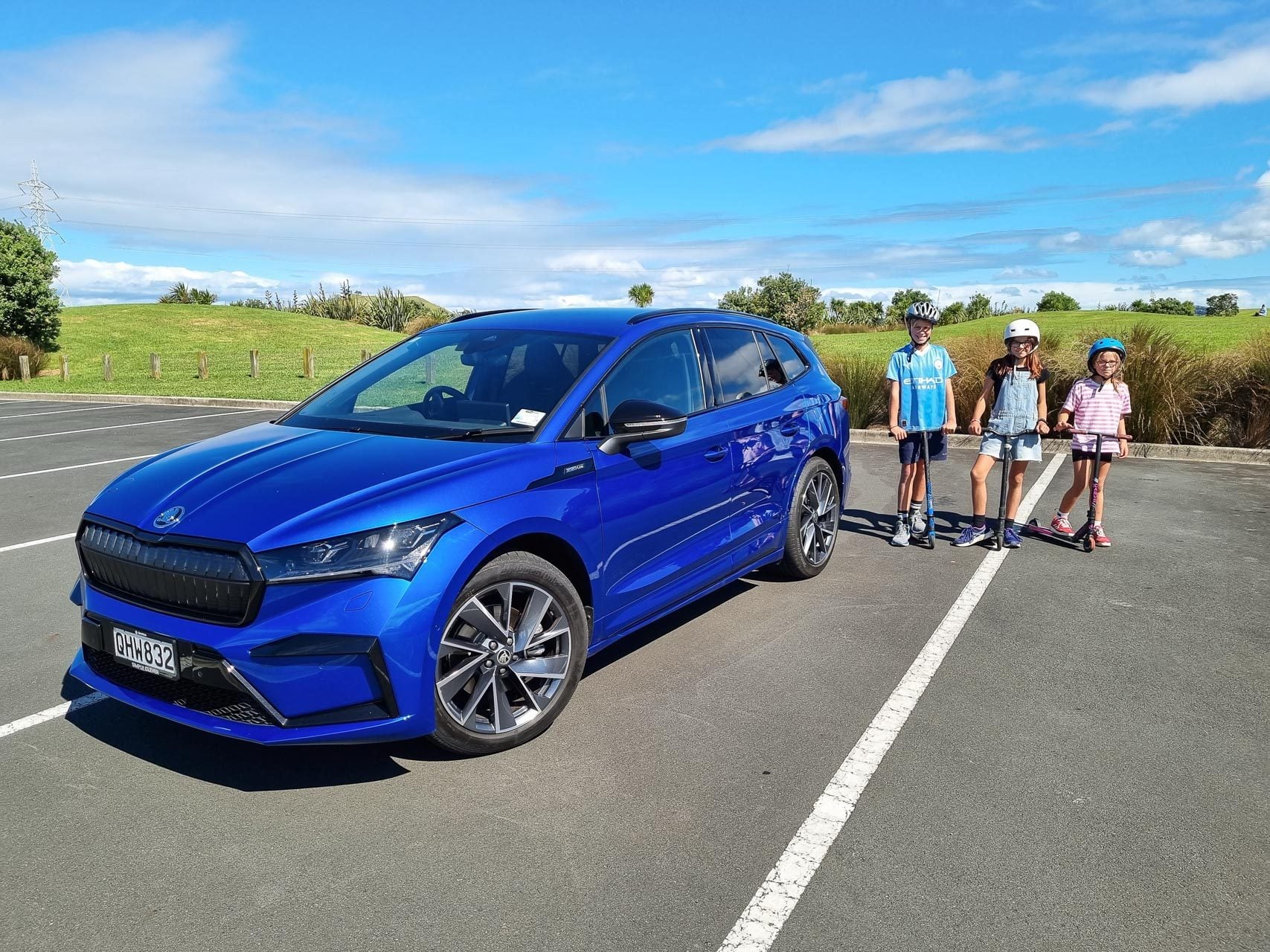 Skoda Enyaq Sportline 80 front quarter shot in blue