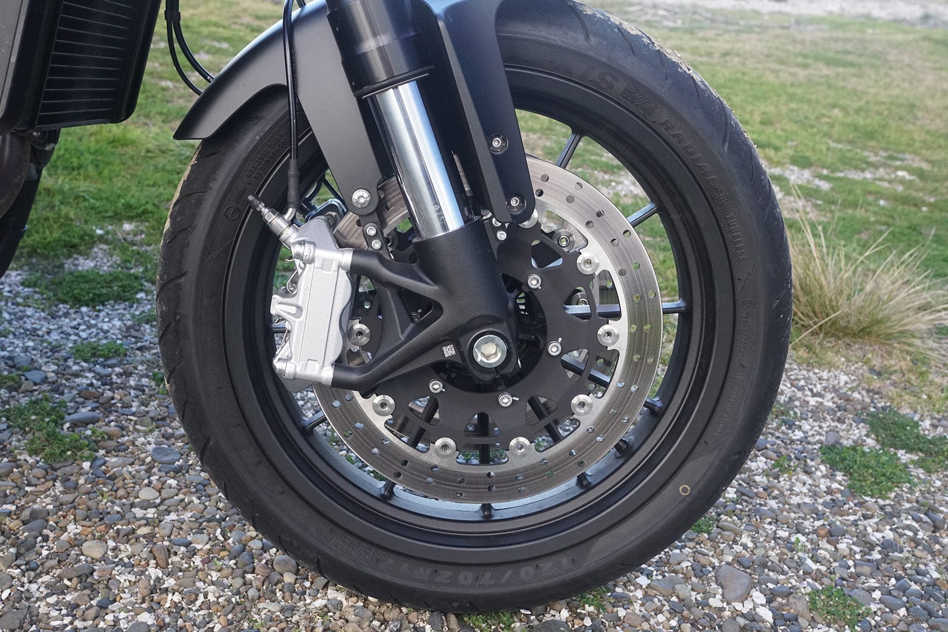 Radial-mount four-piston calipers up front for the X500.