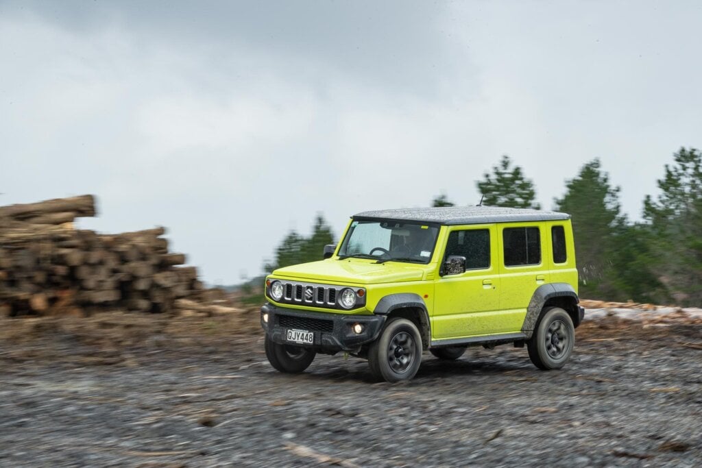 Driving shot of the Suzuki Jimny 5-door on gravel
