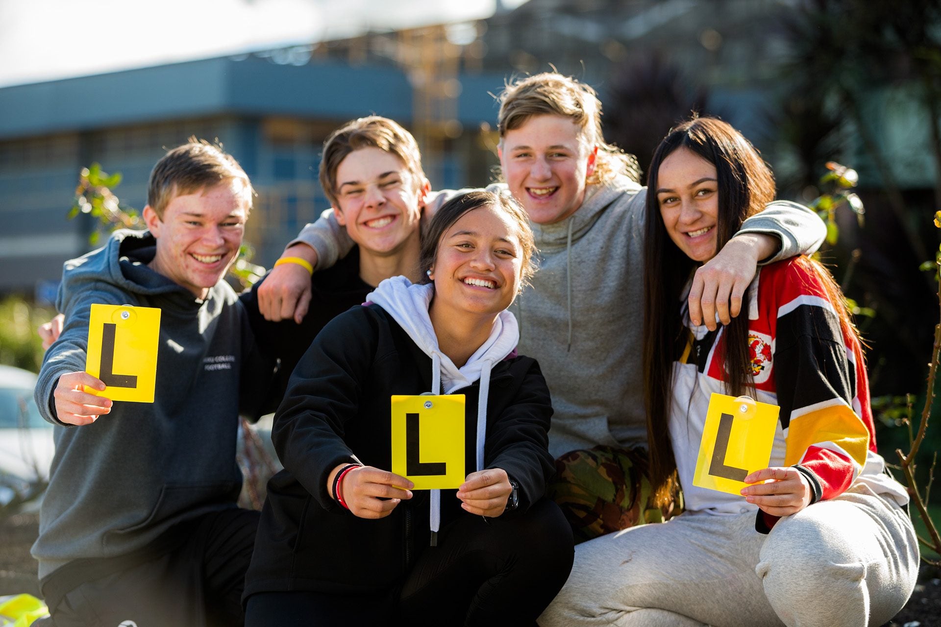 Young drivers with their L plates.