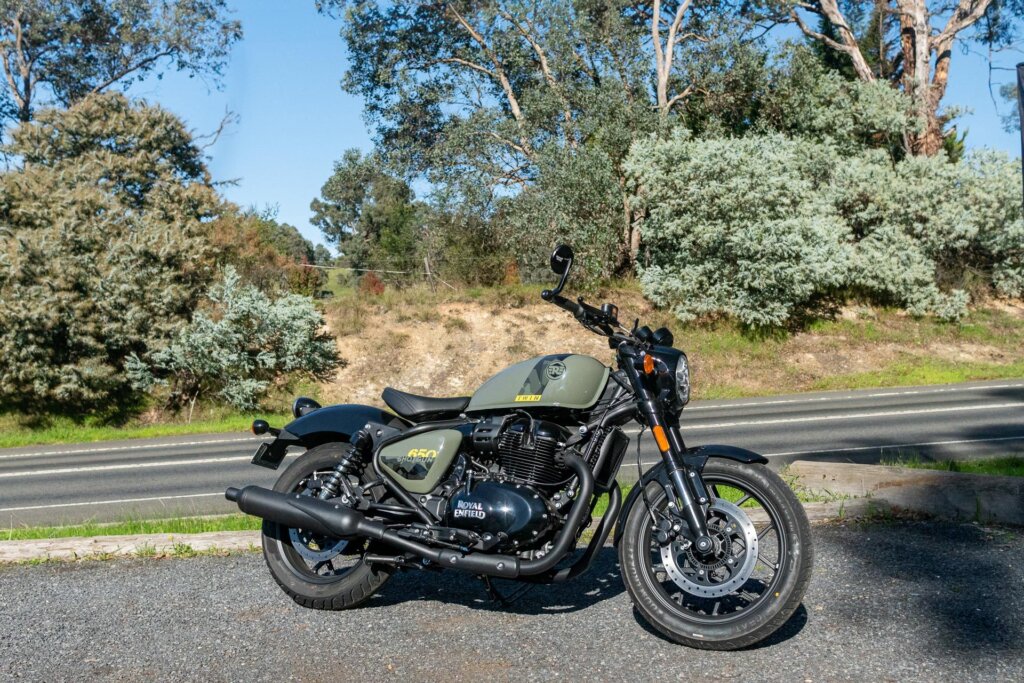 Royal Enfield Shotgun 650 bike, parked next to a road