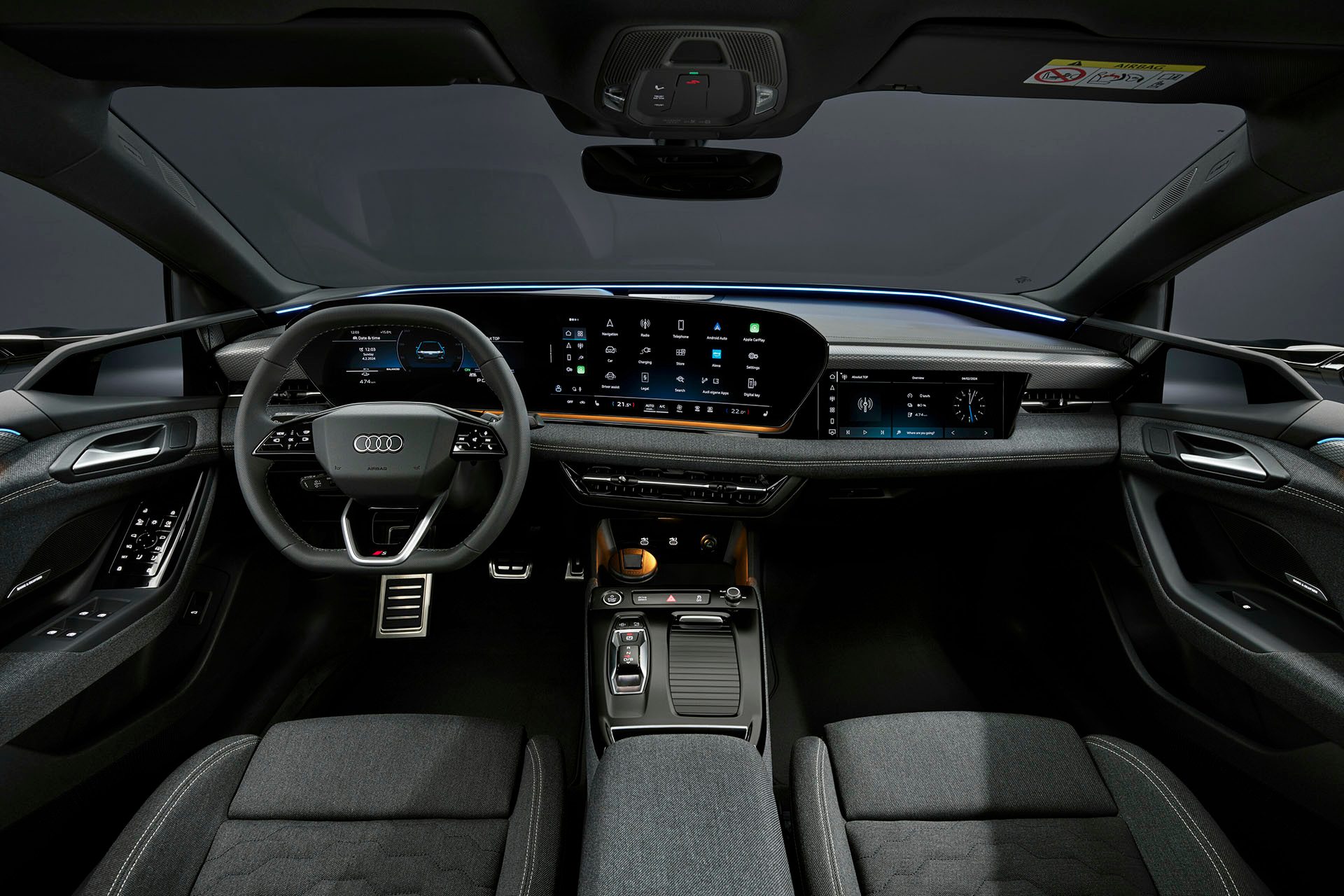 Note the cloth seat finish and optional passenger screen.
