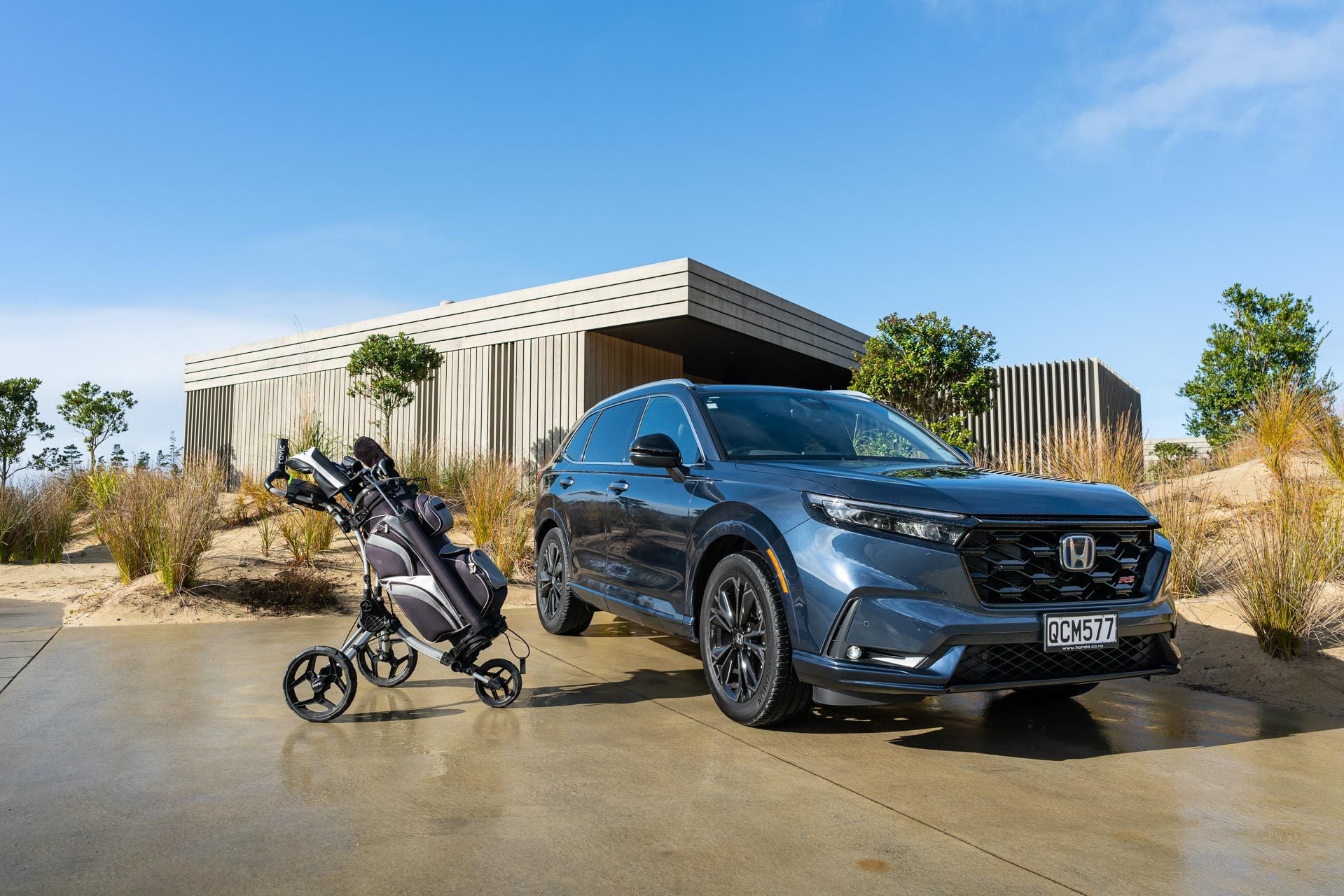2024 Honda CR-V RS front quarter view, parked at a bach