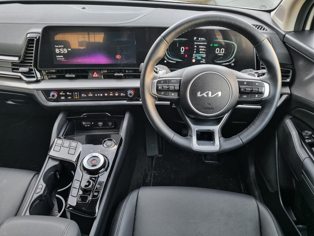 Wide interior view inside the 2024 Kia Sportage Earth Hybrid