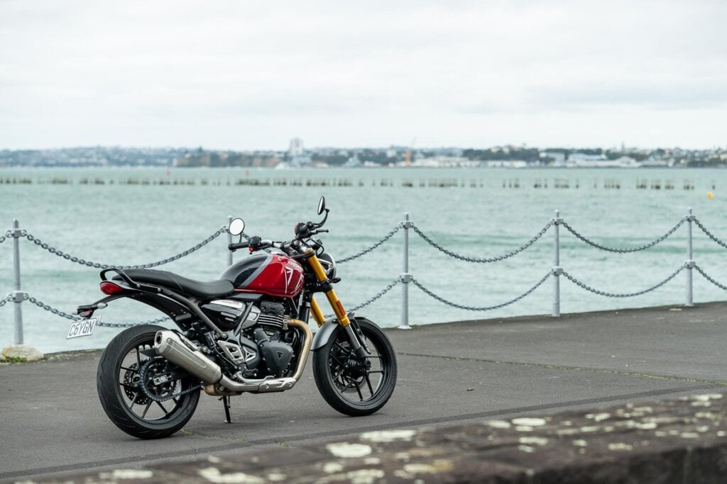 2024 Triumph Speed 400 parked by the sea, on Auckland's waterfront