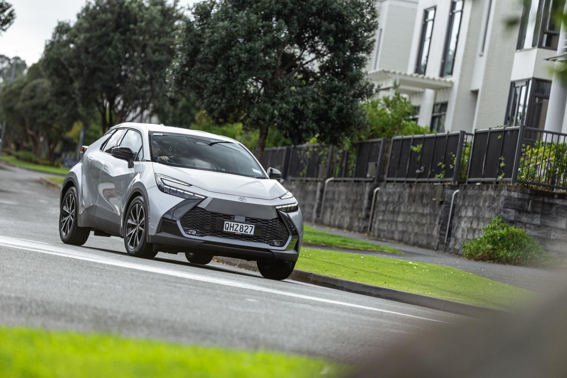 Toyota-C-HR-GXL-Hybrid taking a corner in a suburban neighbourhood