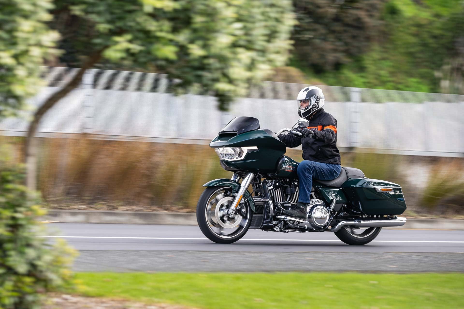 Harley Davidson Road Glide front panning shot, pictured in dark green