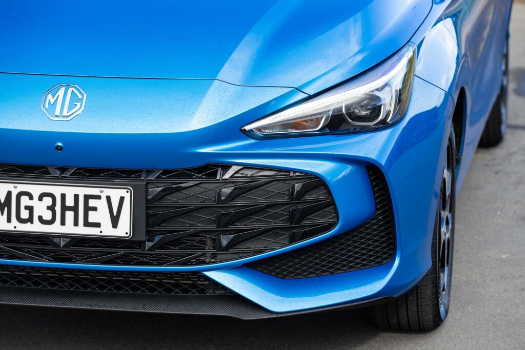 MG3 Hybrid Essence headlight and front grille detail, car shown in blue