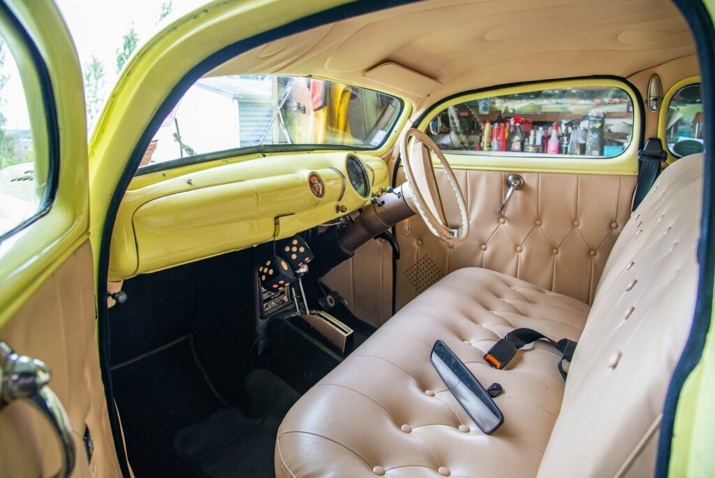 Interior of Ford 47 coupe, with flames stitched into roof