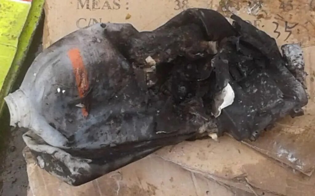 The remains of a lithium-ion battery after it sparked a fire on a recycling truck.