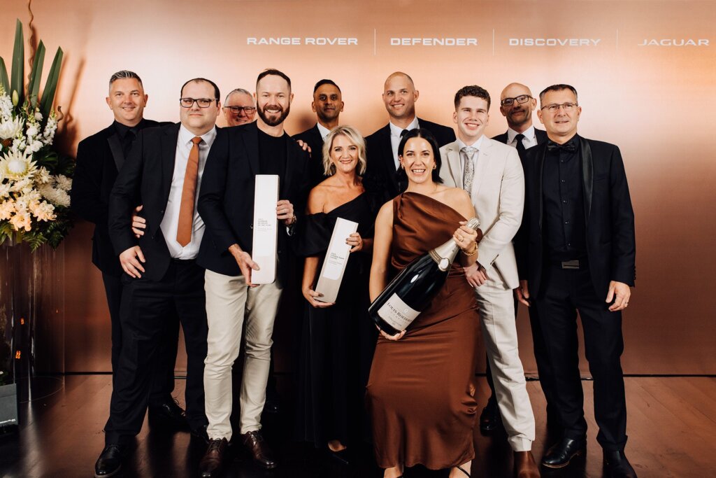 Happy crew from A&S North Shore. Clearly a heavy bottle of champers.