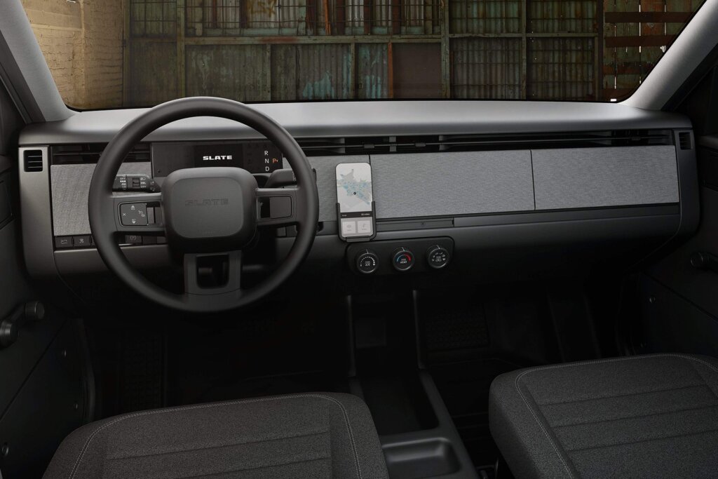 That's a refreshingly simple interior with a phone holder instead of a touchscreen. Stereo is optional.